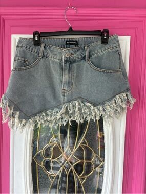 PrettyLittleThing Light Blue Denim Mini Skirt with Frayed Hem